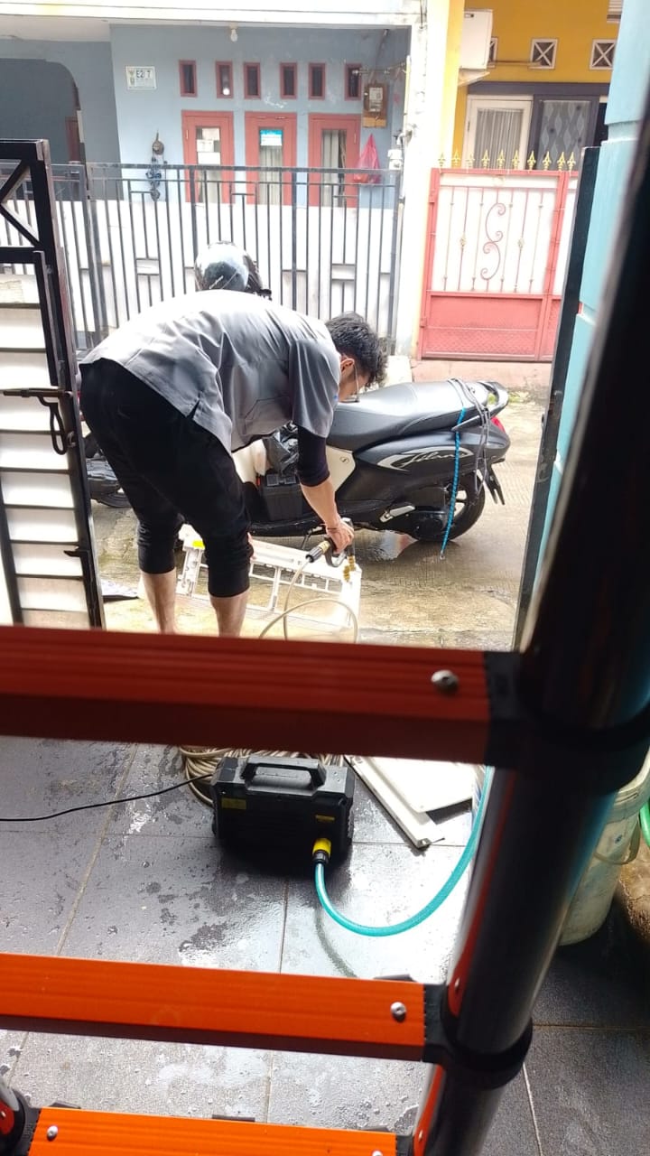 Service mesin cuci top loading Tambun